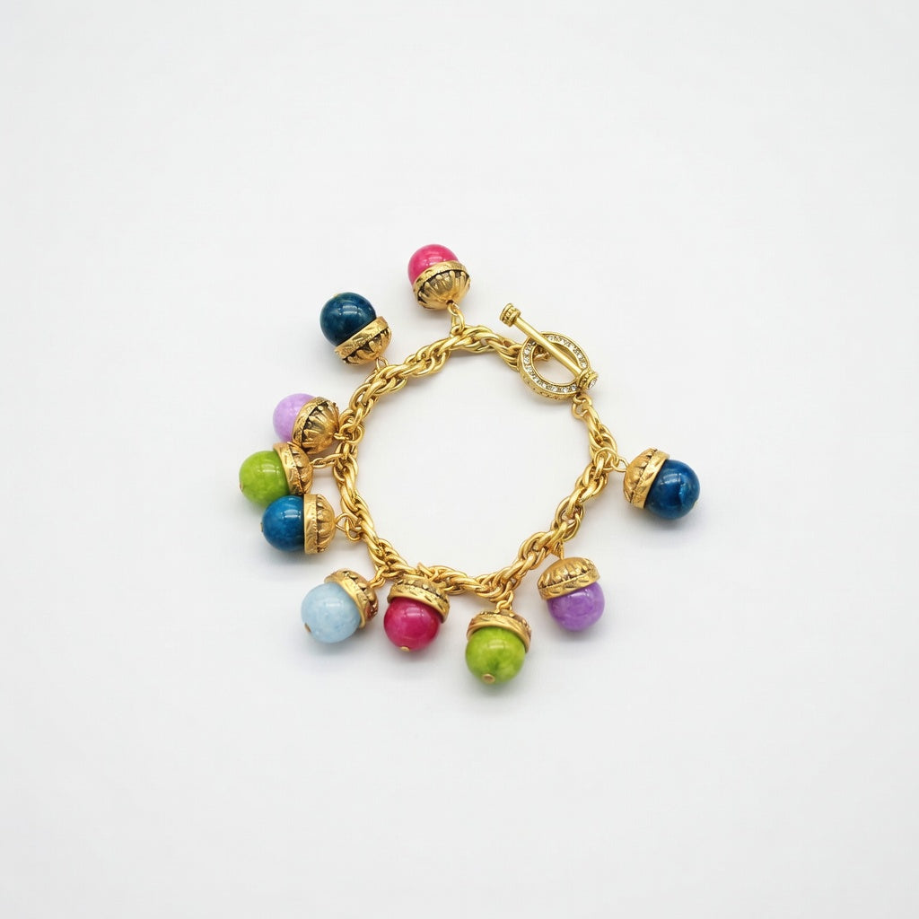 Gold charm bracelet with multicolored stone crystal beads and chain link design