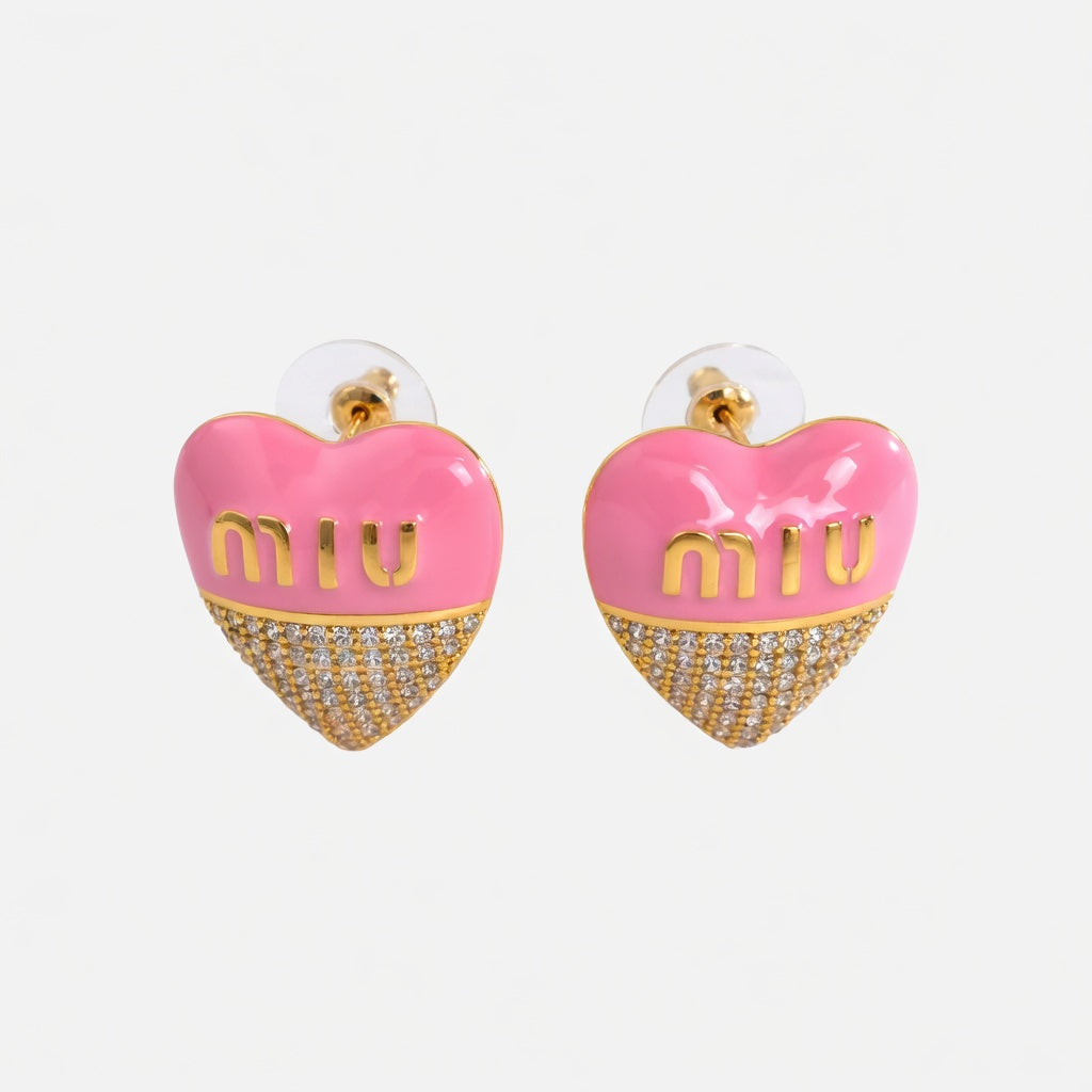 Miu Miu pink heart-shaped enamel earrings with gold logo and crystal-paved lower half