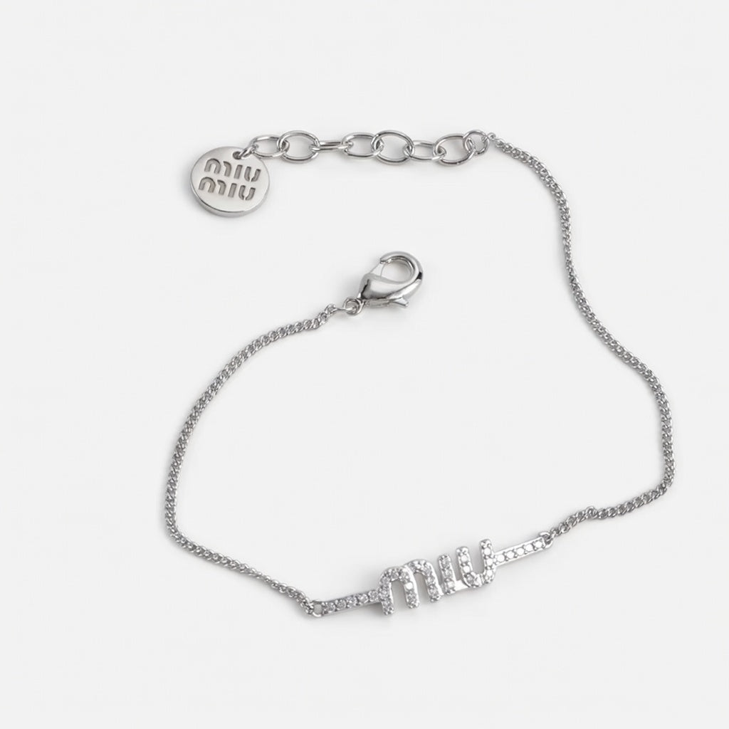 Rhinestone chain bracelet in silver with lobster clasp and Miu Miu logo charms