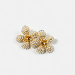Five-petal flower earrings with pearl-like beads and crystal sparkle, gold-tone