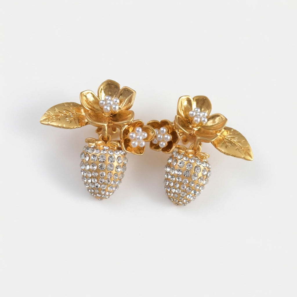 Gold-tone clip-on earrings with pearl-like strawberry and floral detailing