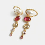 Long crystal drop earrings with red and champagne oval stones, pink accent drops, gold-tone hoops