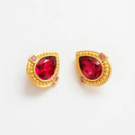 Gold heart-shaped crystal clip-on earrings with red stones and purple accents