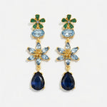 Blue floral crystal teardrop earrings with gold-tone flower and teardrop stones