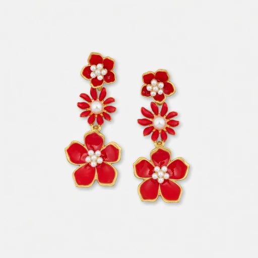 Red enamel plum blossom drop earrings with white pearl centers and gold-tone accents