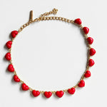 Oscar de la Renta heart necklace with smooth 3D red hearts on gold chain