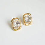 Square crystal stud earrings with gold-tone frames and clear white stones