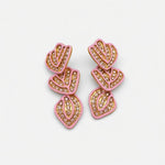 Pink enamel leaf pendant earrings with gold-tone heart leaf designs