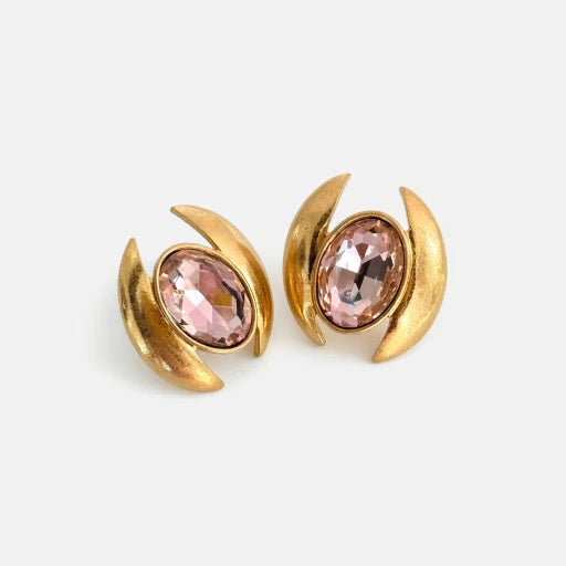 Oval crystal earrings with gold-tone curved settings and light pink oval stones