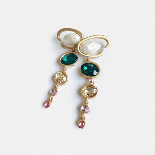 Long crystal drop earrings with green oval gems and pearl-like drops, gold-tone loops