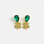 Gold-tone four-leaf clover drop earrings with green teardrop crystals