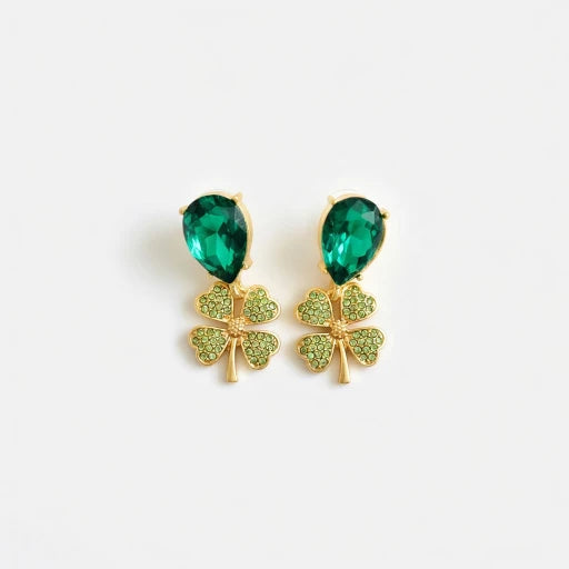 Gold-tone four-leaf clover drop earrings with green teardrop crystals