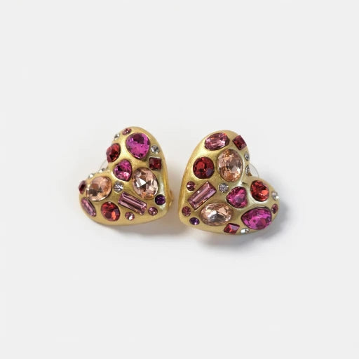 Gold-tone heart stud earrings with pink and rose crystals and dark accents.