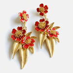 Enamel floral drop earrings with red flower petals and gold-tone dangling drops