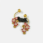 Gold-tone enamel flower hoop earrings with red and black floral details