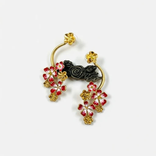 Gold-tone enamel flower hoop earrings with red and black floral details