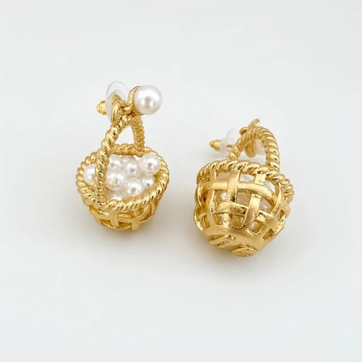 Gold basket stud earrings with pearl drops and woven lattice detail