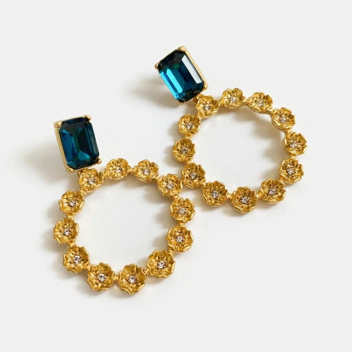 Large round hoop earrings with floral zircon and gold-tone setting, blue rectangular stones