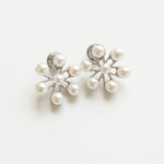 Oscar de la Renta pearl floral earrings with clustered white pearls