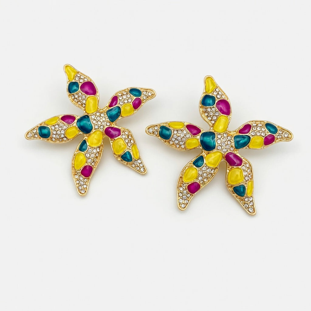 Enamel starfish flower earrings with yellow, teal, and magenta spots, gold-tone setting