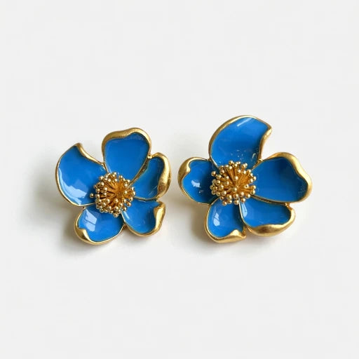 Oscar de la Renta enamel floral stud earrings, blue enamel flowers with gold-tone edges and bead centers.