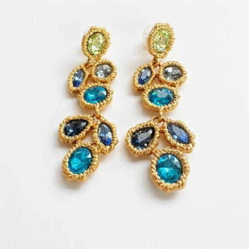 Gold-tone drop earrings with blue teardrop crystal clusters, Oscar de la Renta