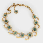 Diamond floral O-ring necklace with teal crystal clover charms and gold O-ring links
