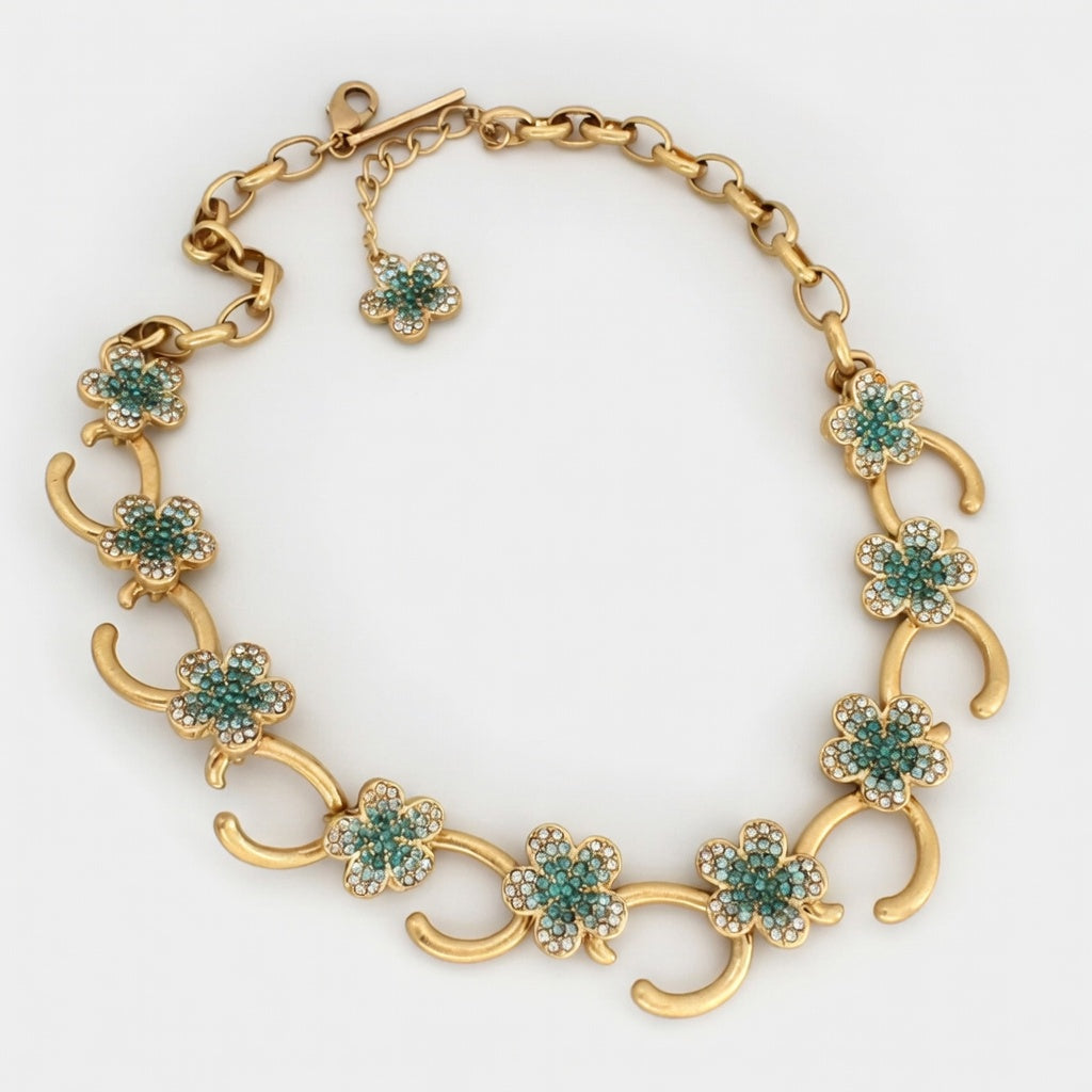 Diamond floral O-ring necklace with teal crystal clover charms and gold O-ring links